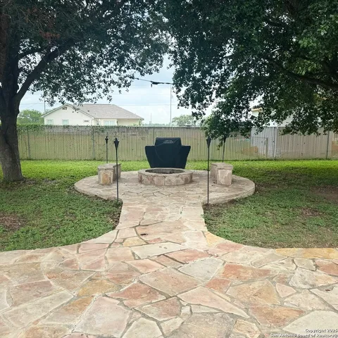 a view of a garden with a slide