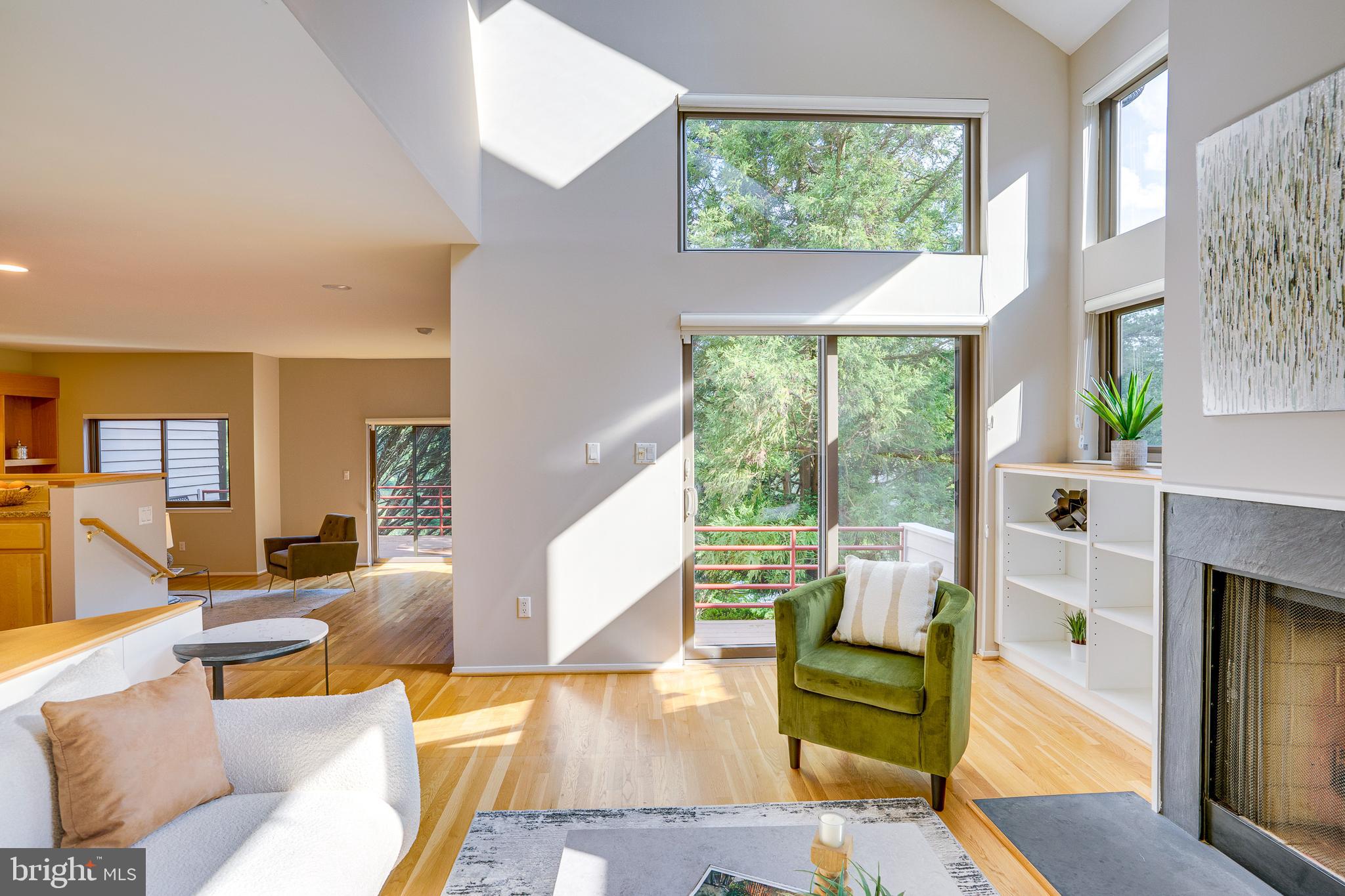2148 South Bay Lane Reston, VA 20191 - Photo 11 of 73 a living room with furniture and a large window