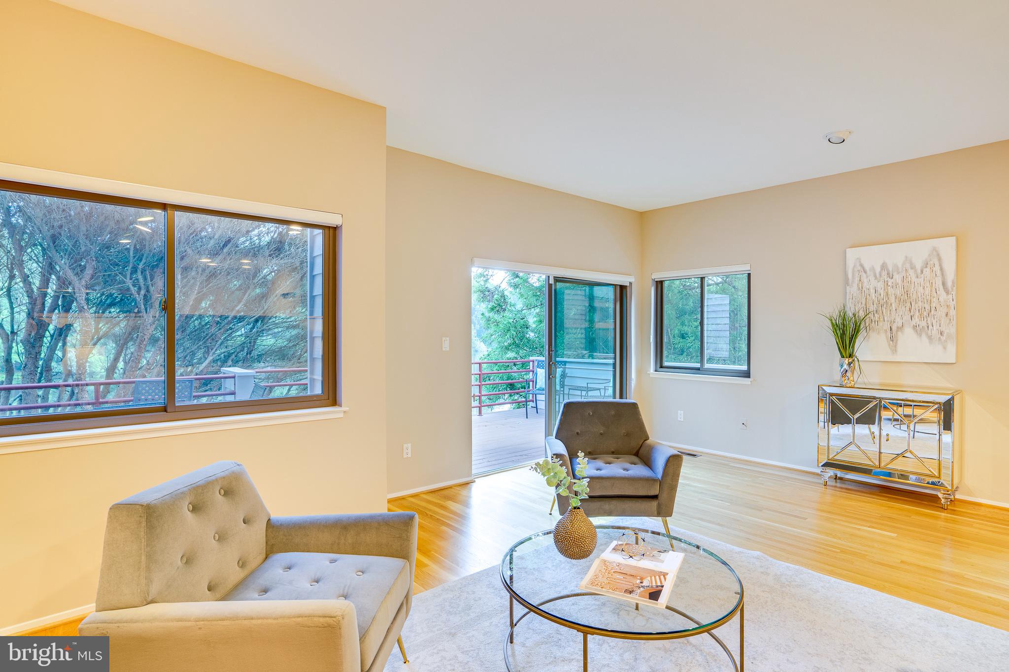 2148 South Bay Lane Reston, VA 20191 - Photo 24 of 73 a living room with furniture and a window