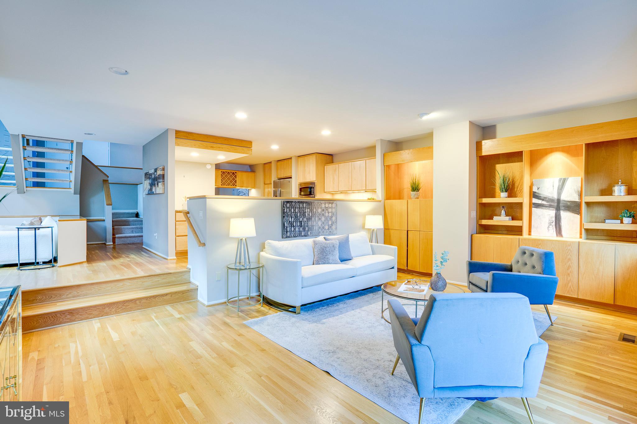 2148 South Bay Lane Reston, VA 20191 - Photo 27 of 73 a living room with furniture and a large window