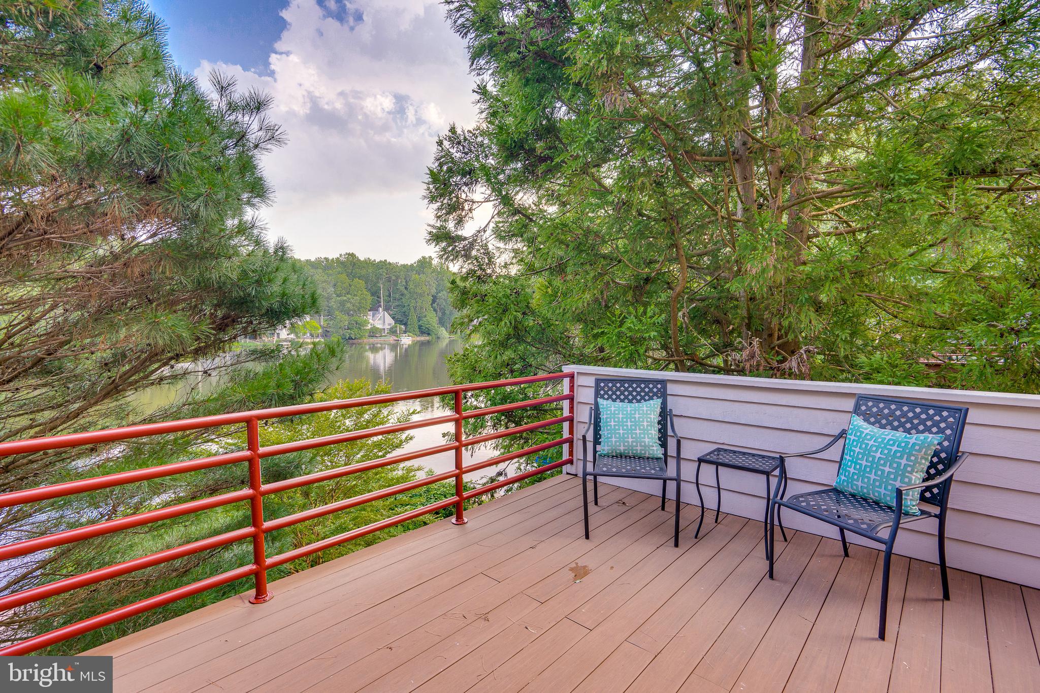 2148 South Bay Lane Reston, VA 20191 - Photo 28 of 73 a view of a bench in a roof deck