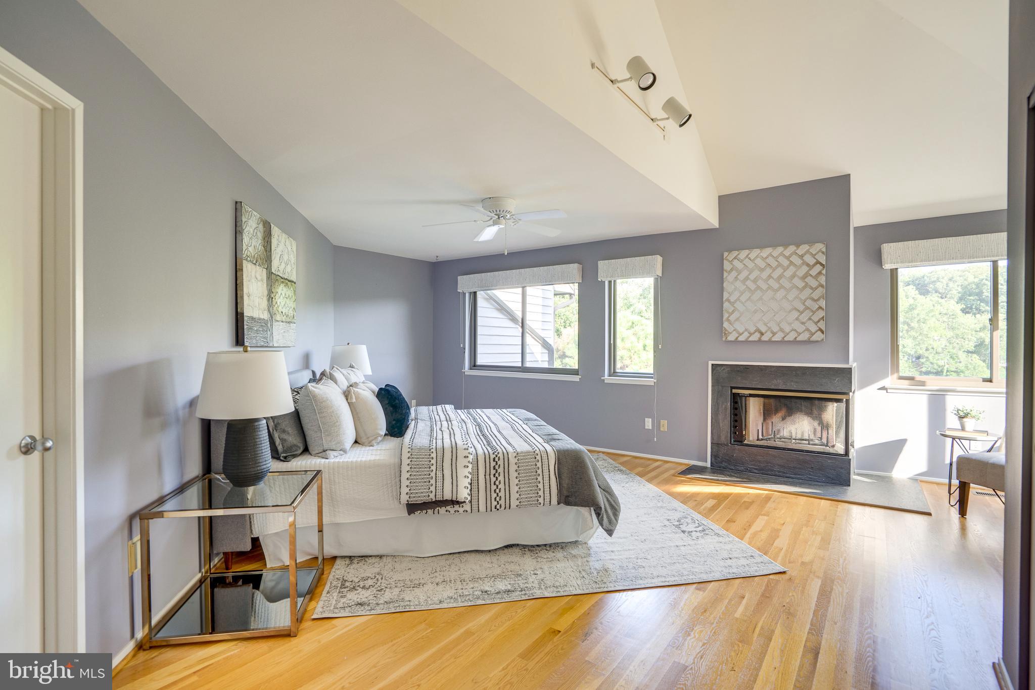2148 South Bay Lane Reston, VA 20191 - Photo 45 of 73 a living room with furniture and a fireplace