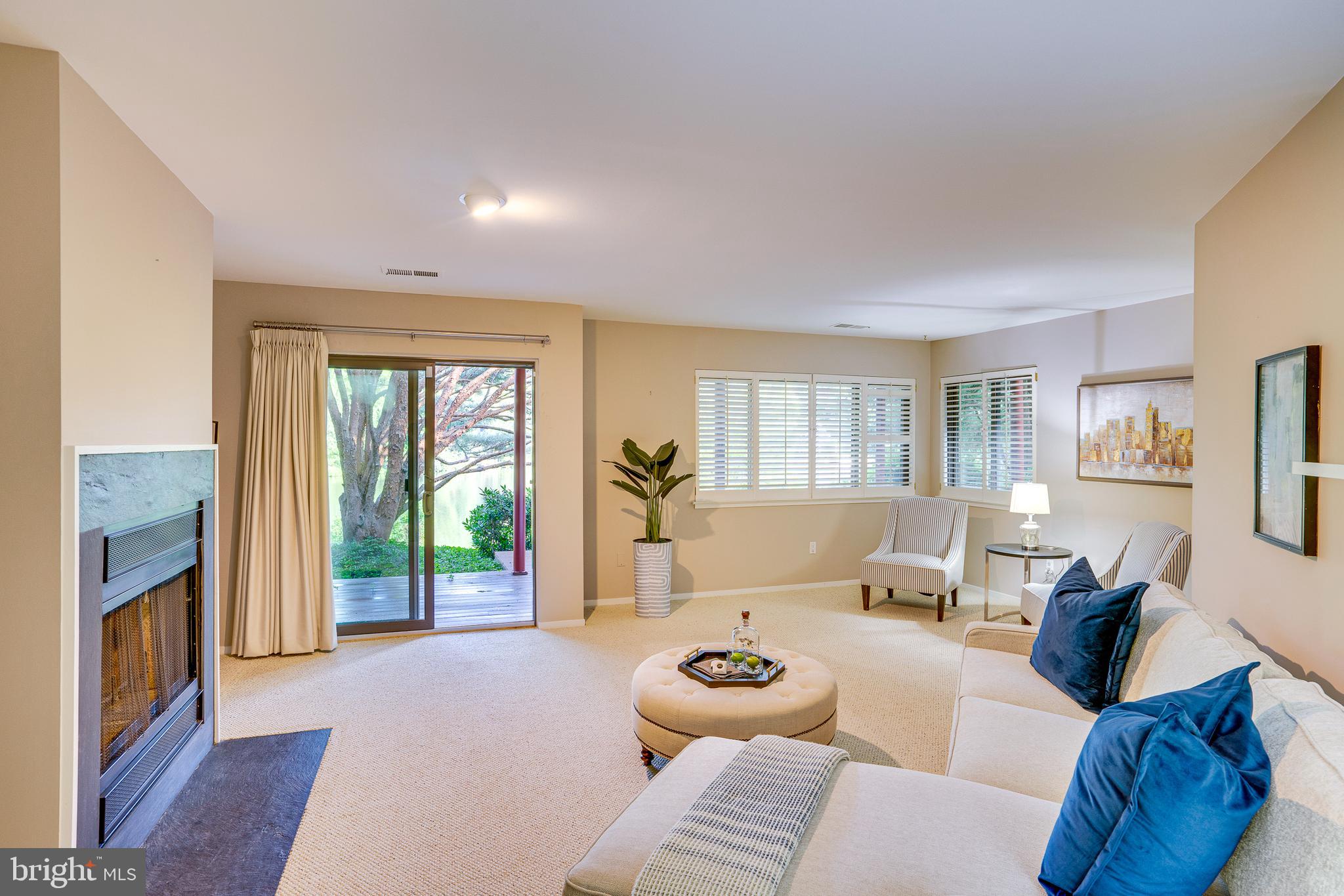 2148 South Bay Lane Reston, VA 20191 - Photo 48 of 73 a living room with furniture and a window