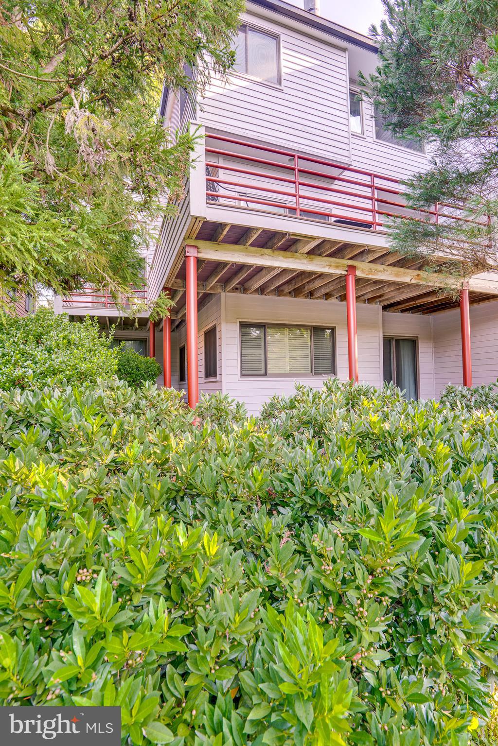 2148 South Bay Lane Reston, VA 20191 - Photo 67 of 73 front view of a house with a big yard