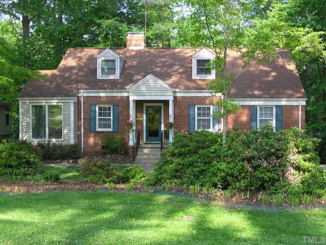 1515 Duplin Road Raleigh, NC 27607 - Photo 1 of 1 a front view of a house with a yard