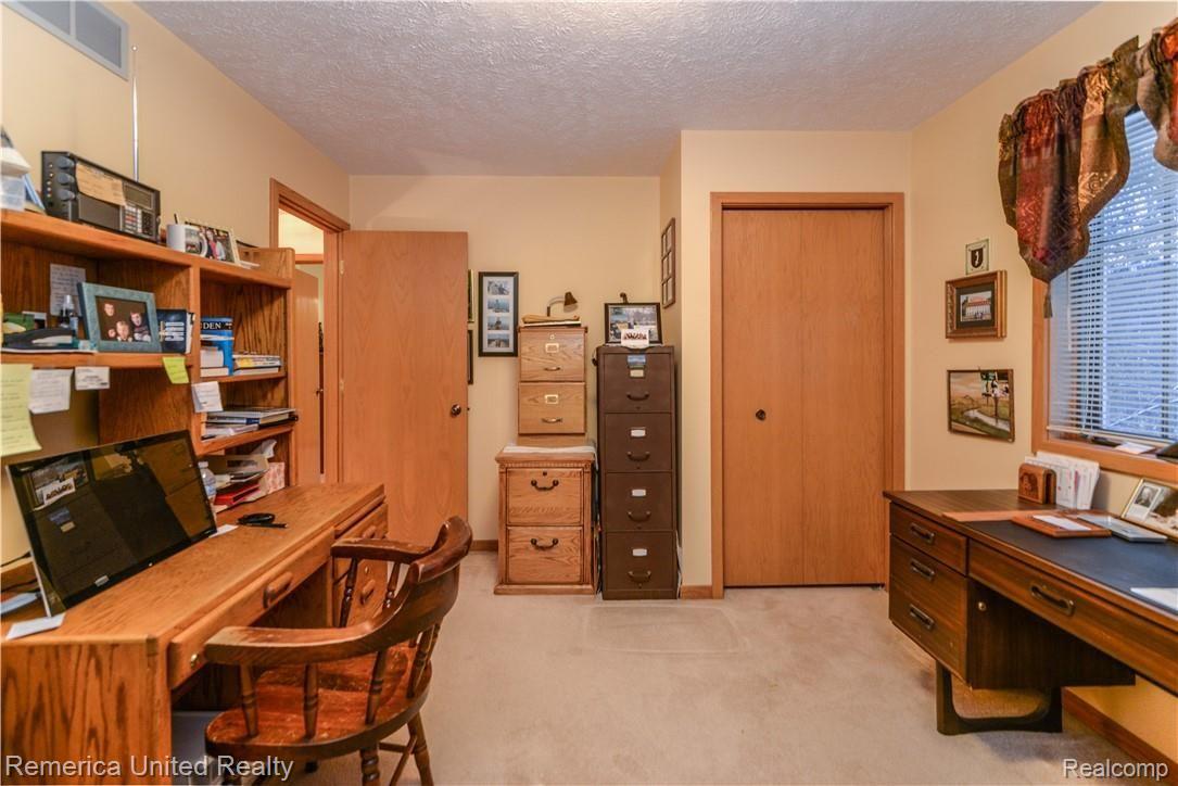 12264 Raelyn Hills Drive Perry, MI 48872 - Photo 32 of 46 Bedroom w/ Built Ins in the Closet