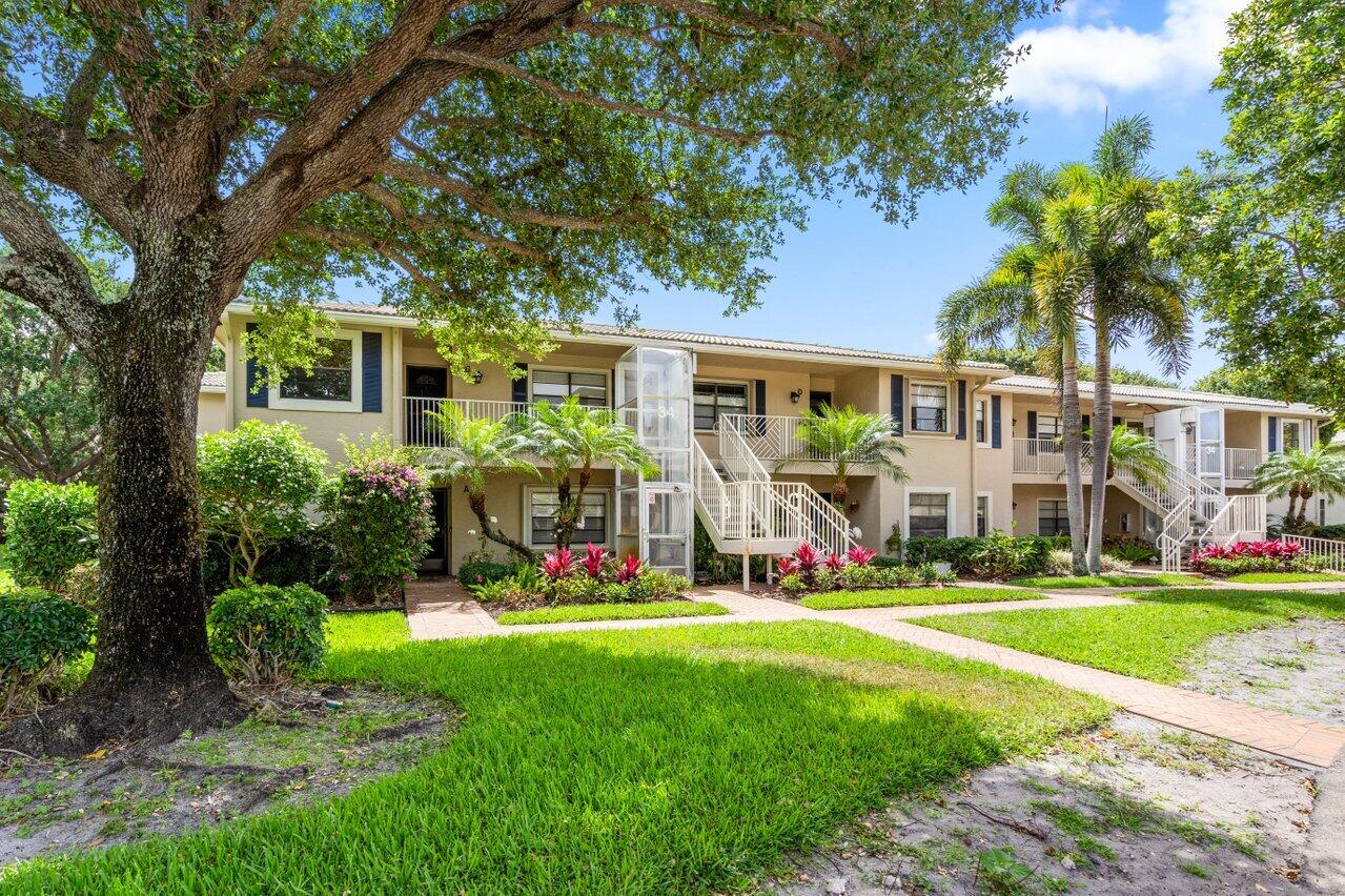 34 Stratford Lane West, Unit C Boynton Beach, FL 33436 - Photo 2 of 38 a view of outdoor space yard and patio
