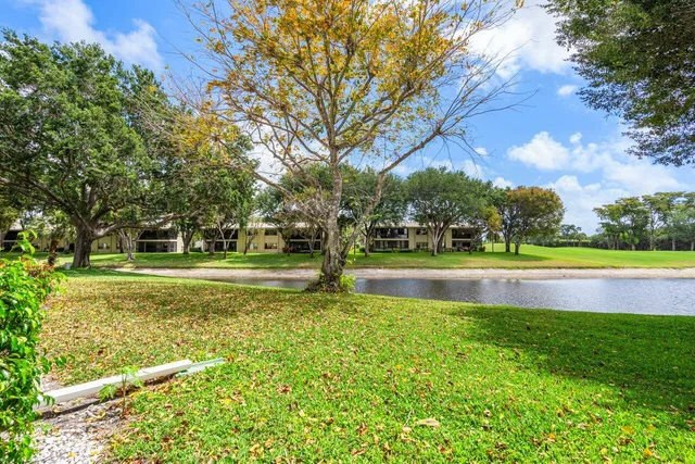 a view of pool with a big yard