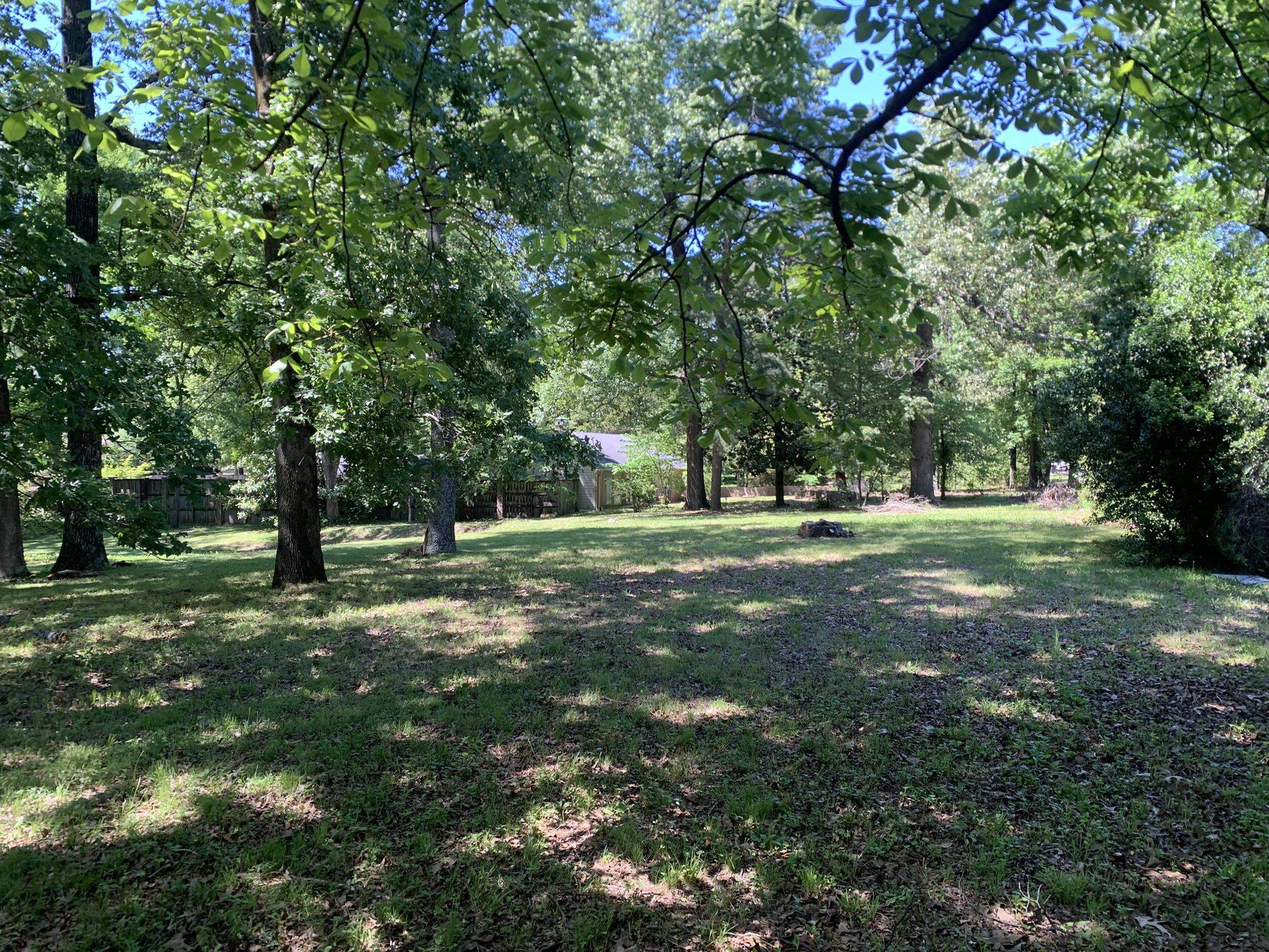 901 South Perkins Road Memphis, TN 38117 - Photo 2 of 13 a view of grassy field with trees