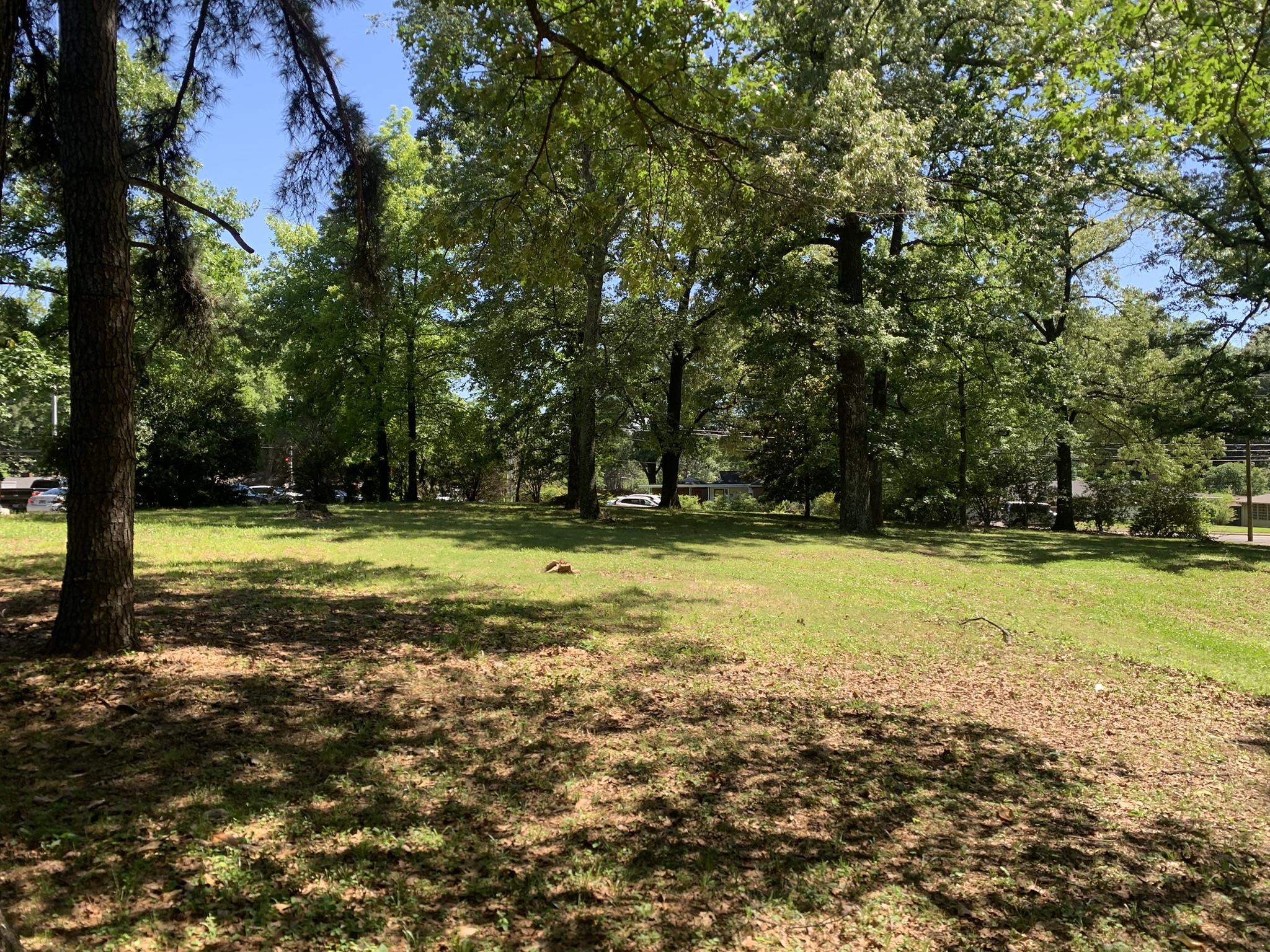 901 South Perkins Road Memphis, TN 38117 - Photo 3 of 13 a view of swimming pool with a yard