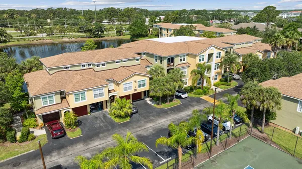 an aerial view of residential houses and outdoor space