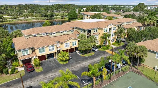an aerial view of residential houses and outdoor space