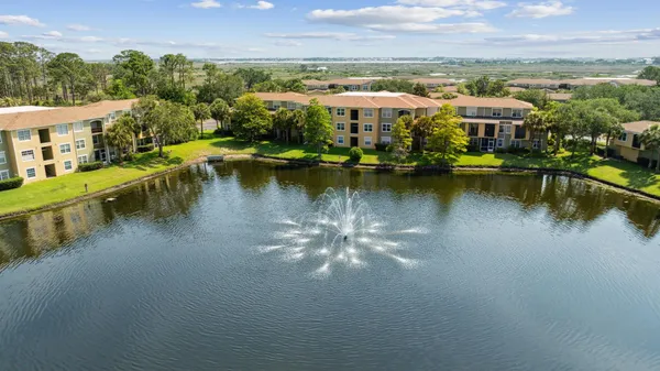 a view of a lake with a city