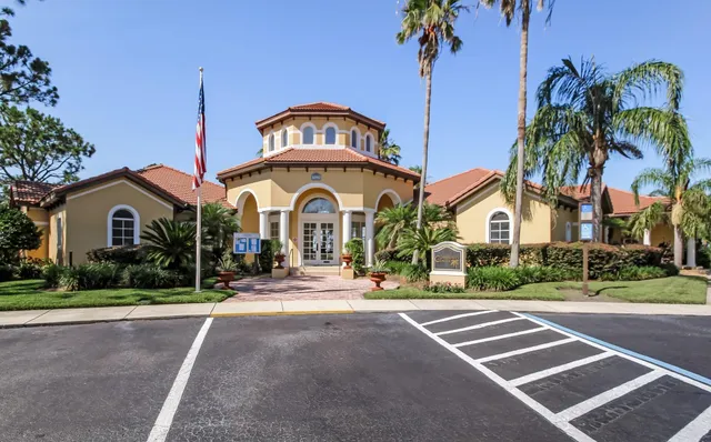 a view of multiple houses with a yard