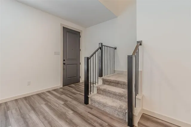 a view of entryway with stairs