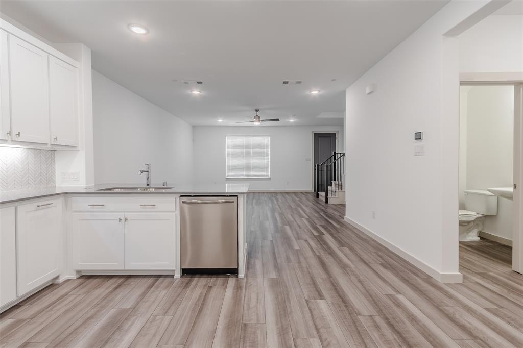 682 Vista Oaks Road Lewisville, TX 75067 - Photo 38 of 38 a view of a kitchen with wooden floor
