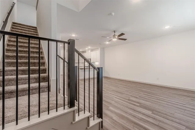 a view of a kitchen with wooden floor