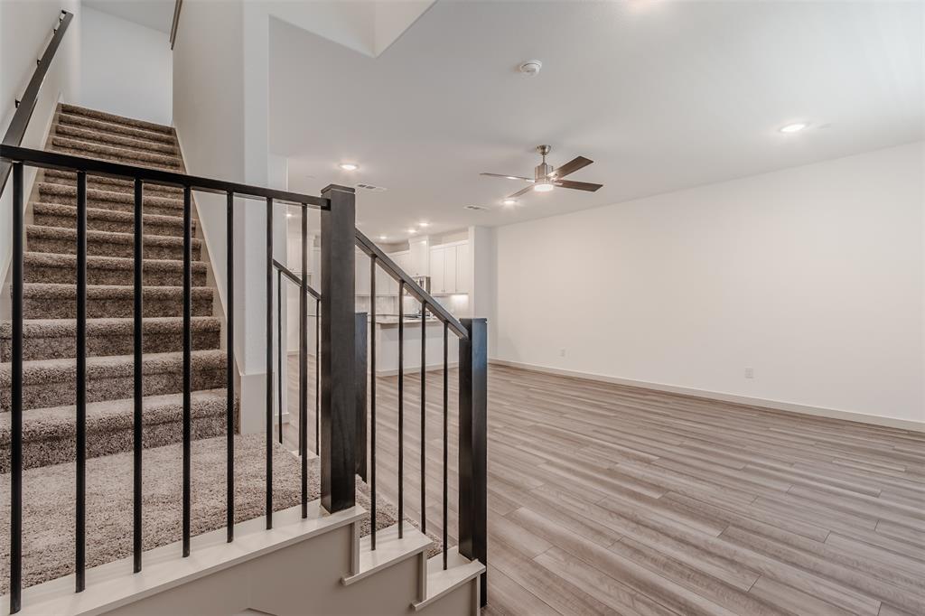 682 Vista Oaks Road Lewisville, TX 75067 - Photo 9 of 38 a view of entryway with stairs