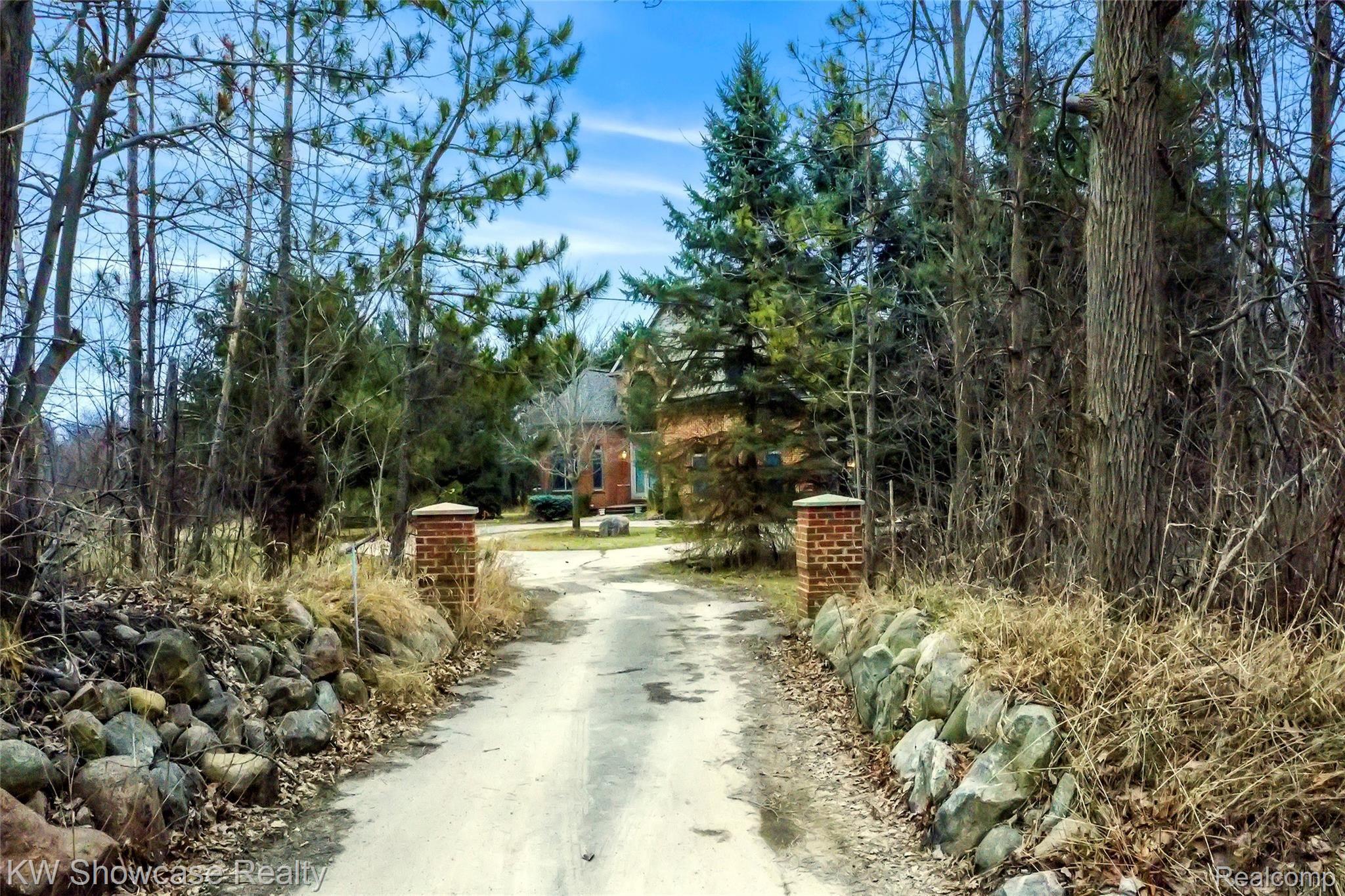 2828 Porter Road White Lake, MI 48383 - Photo 2 of 75 Tucked back off the road with plenty of privacy!