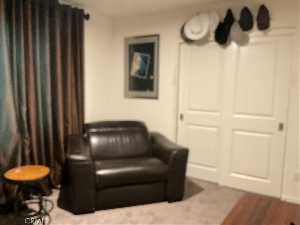 27393 Red Rock Road Moreno Valley, CA 92555 - Photo 12 of 31 a living room with furniture and a window