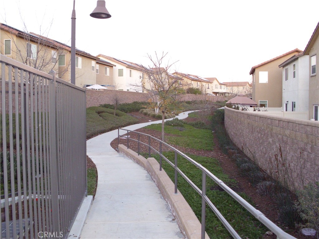 27393 Red Rock Road Moreno Valley, CA 92555 - Photo 25 of 31 a view of a balcony with a yard