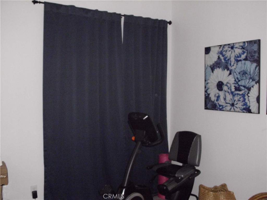 27393 Red Rock Road Moreno Valley, CA 92555 - Photo 10 of 31 a bathroom with a sink and a mirror