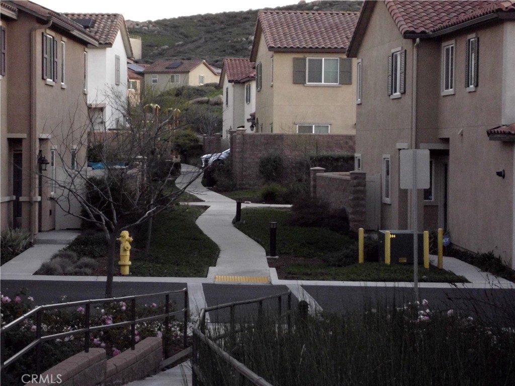 27393 Red Rock Road Moreno Valley, CA 92555 - Photo 10 of 19 Walkway to pool & jacuzzi.