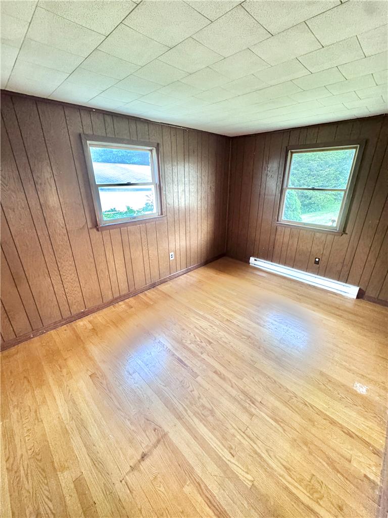 8325 Schantz Road Breinigsville, PA 18031 - Photo 12 of 21 Original hardwood floors extend through this bedroom, providing warmth and character.