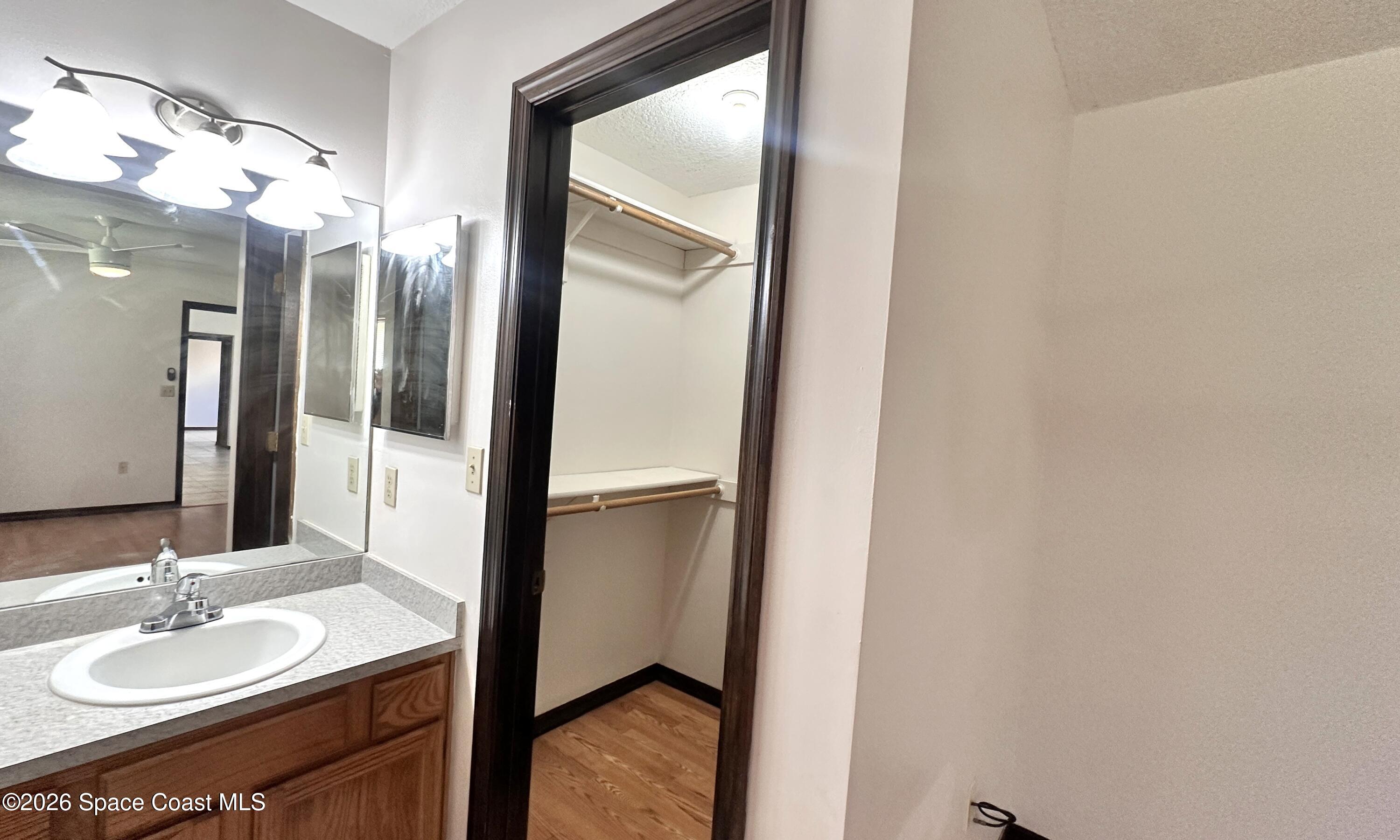 931 Commerce Road Southeast Palm Bay, FL 32909 - Photo 11 of 19 931 Primary bath & Closet