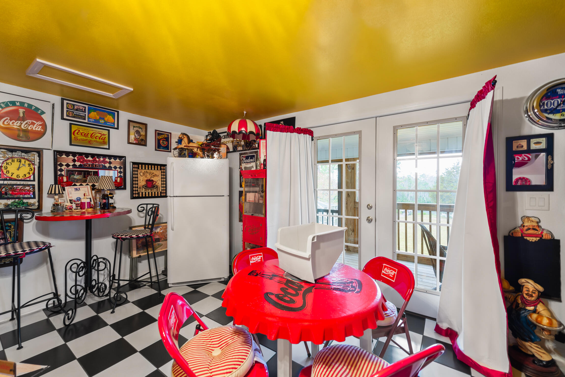 9524 Bone Bluff Drive Navarre, FL 32566 - Photo 30 of 68 a living room with furniture and a floor to ceiling window