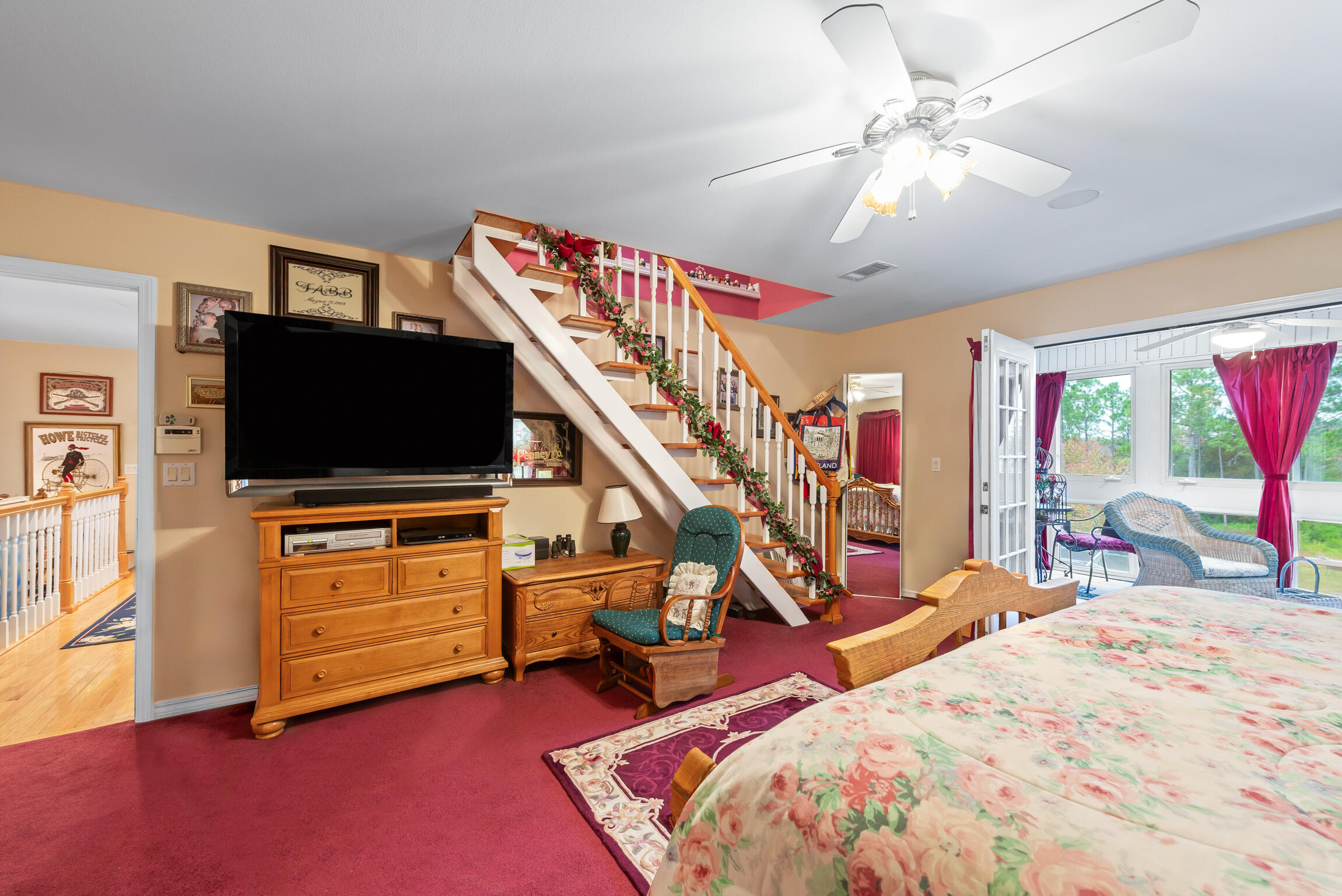 9524 Bone Bluff Drive Navarre, FL 32566 - Photo 38 of 68 a bed room with a bed and a flat screen tv