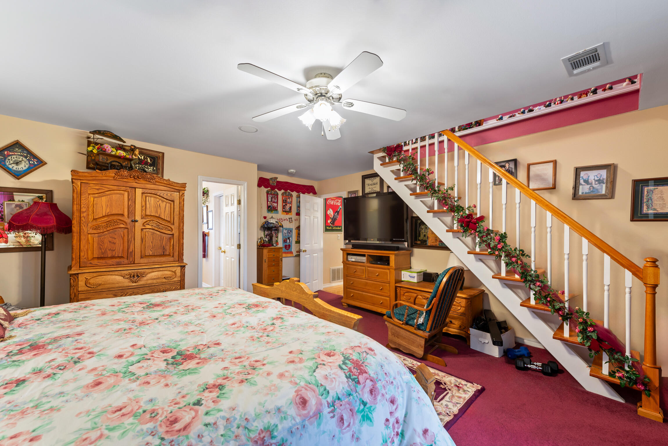 9524 Bone Bluff Drive Navarre, FL 32566 - Photo 39 of 68 a bedroom with bed and wooden floor