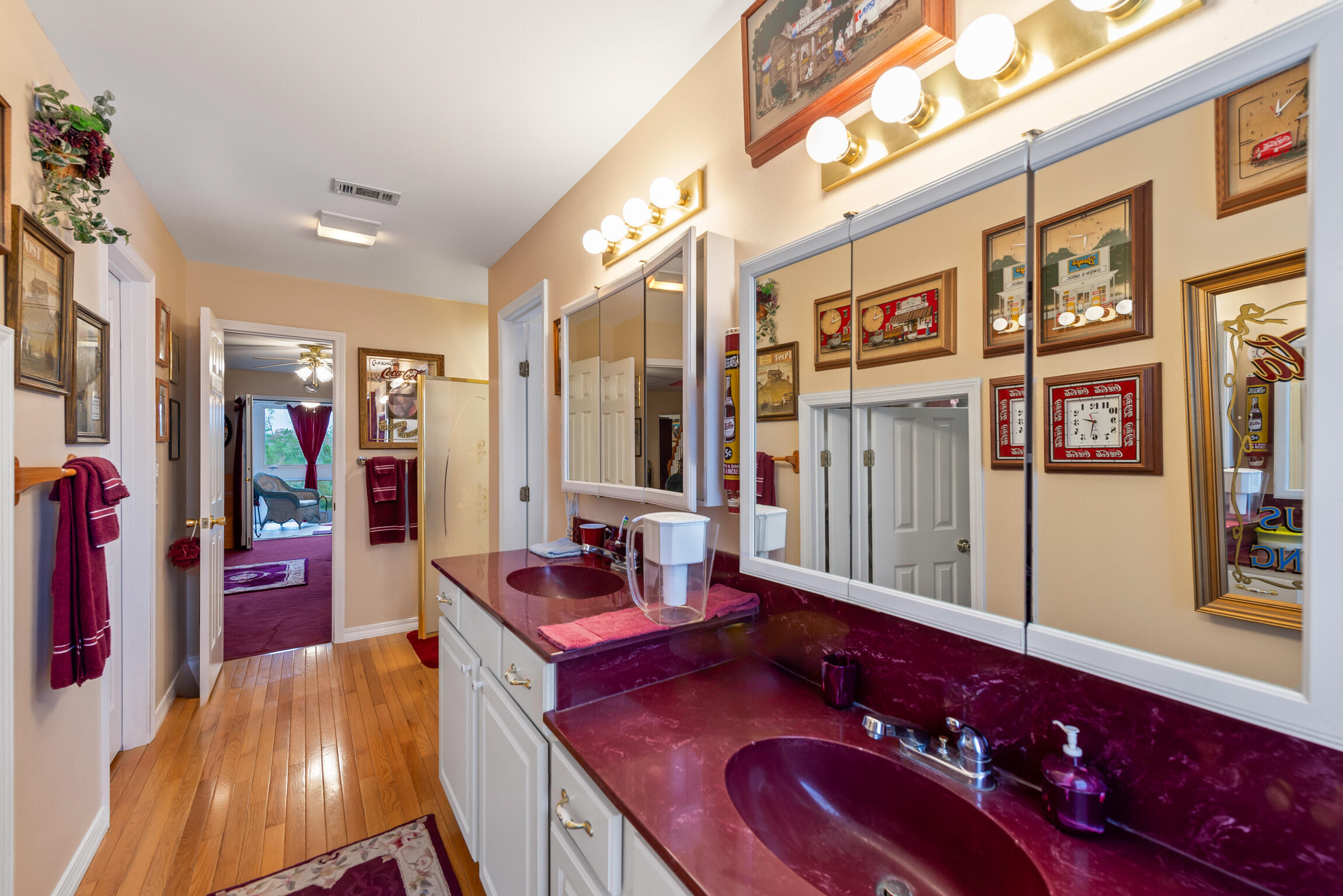 9524 Bone Bluff Drive Navarre, FL 32566 - Photo 43 of 68 a bathroom with a sink vanity granite tub shower and a mirror