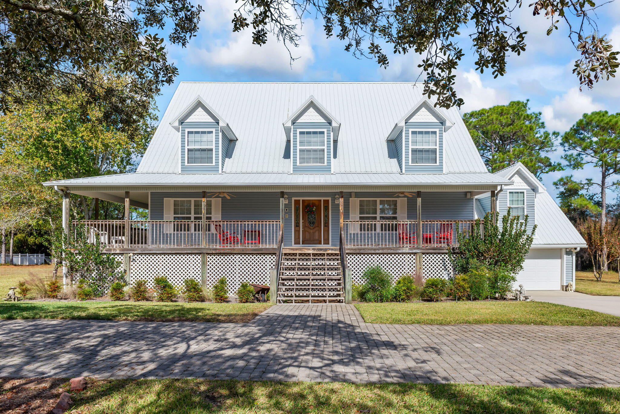 9524 Bone Bluff Drive Navarre, FL 32566 - Photo 5 of 68 a view of a yard in front of a house