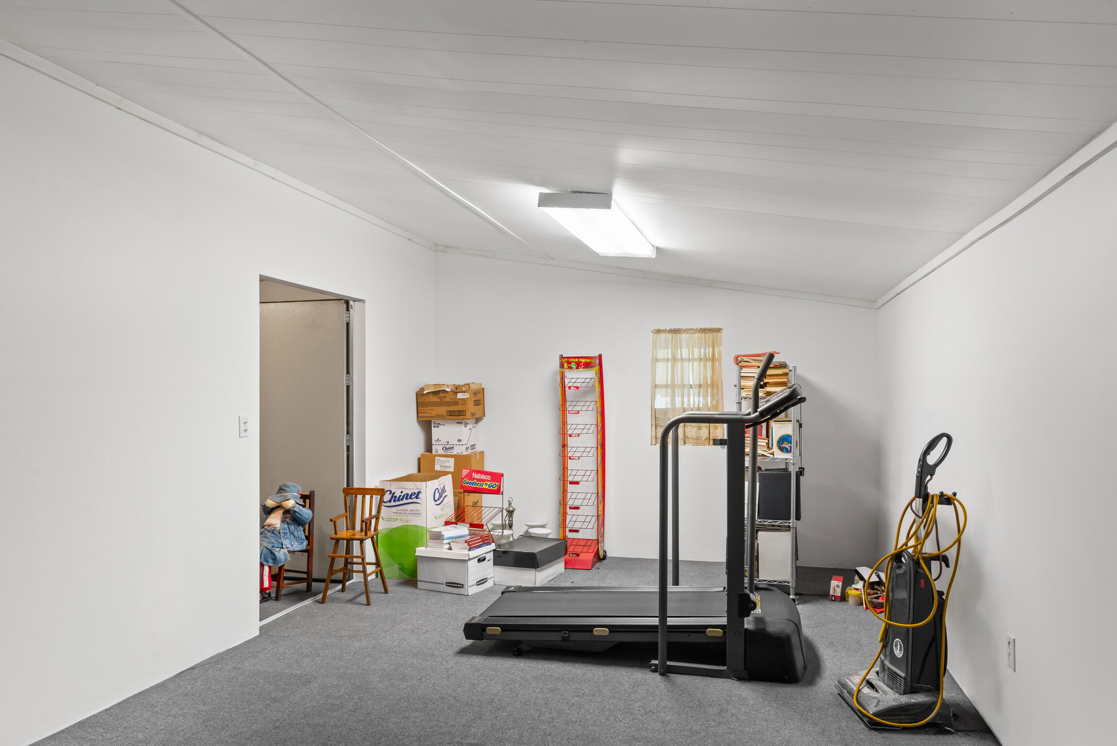 9524 Bone Bluff Drive Navarre, FL 32566 - Photo 54 of 68 a view of a room with gym equipment