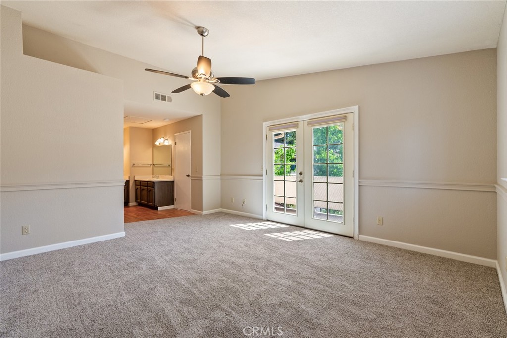6815 Santa Lucia Road, Unit 5 Atascadero, CA 93422 - Photo 21 of 44 Primary bedroom - Greet the day through the French door to the balcony.