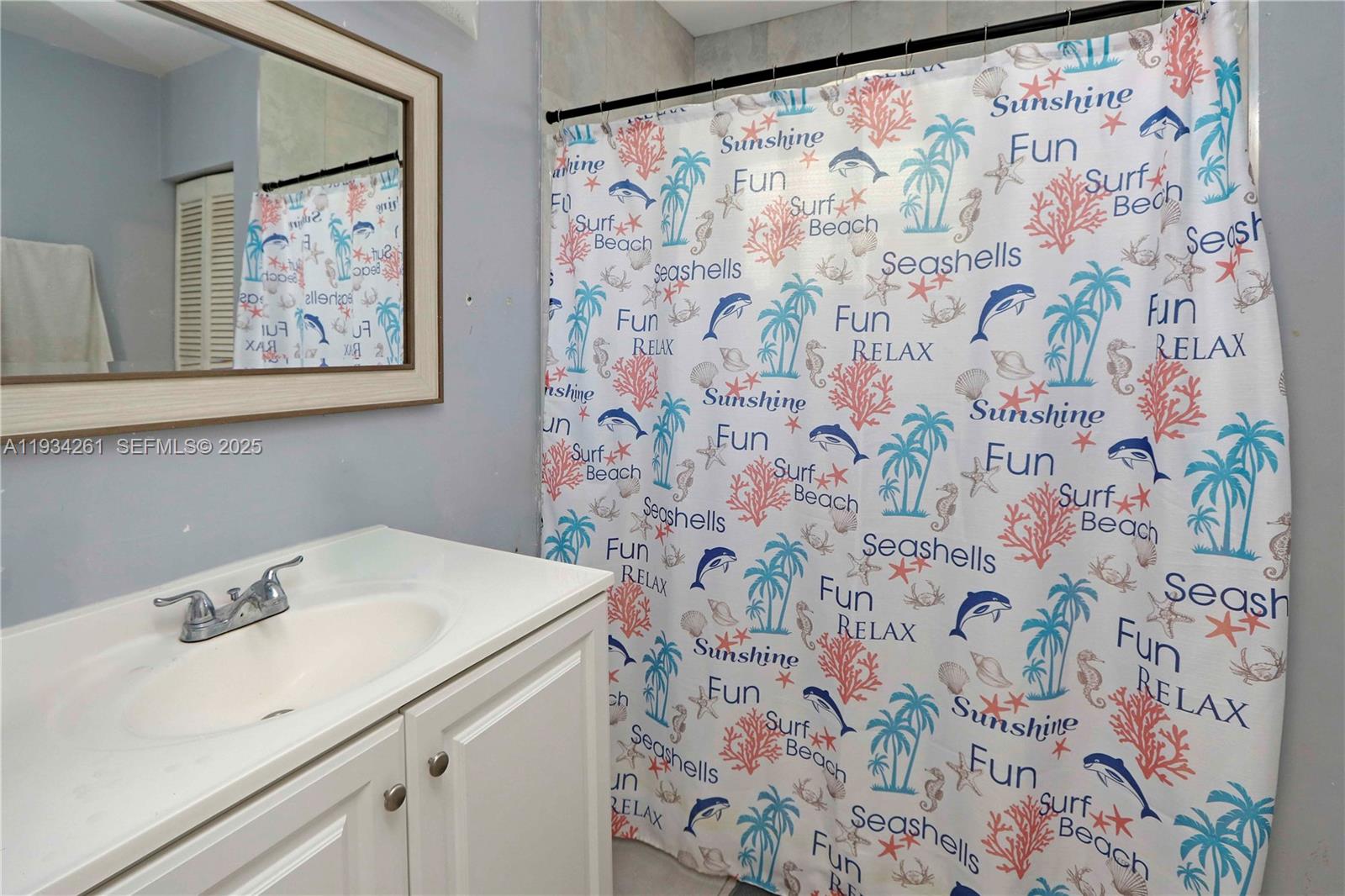 514 Northwest 21st Street Homestead, FL 33030 - Photo 19 of 45 a view of a utility room with a window and curtain