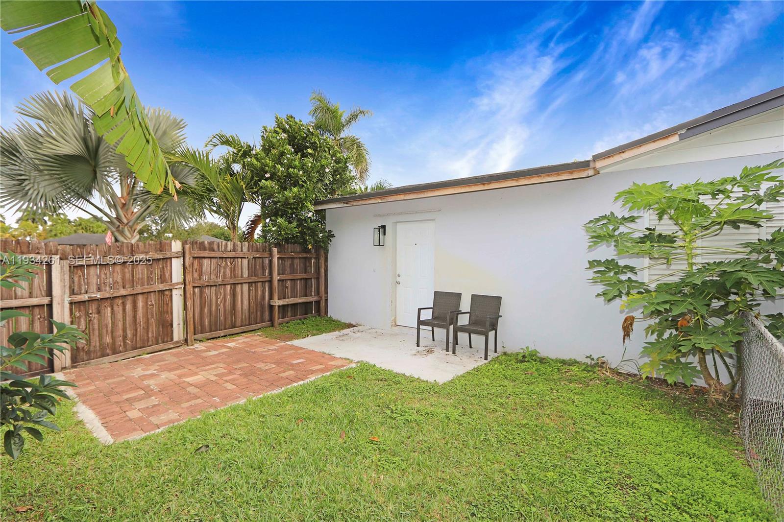 514 Northwest 21st Street Homestead, FL 33030 - Photo 21 of 45 a view of a backyard with a patio