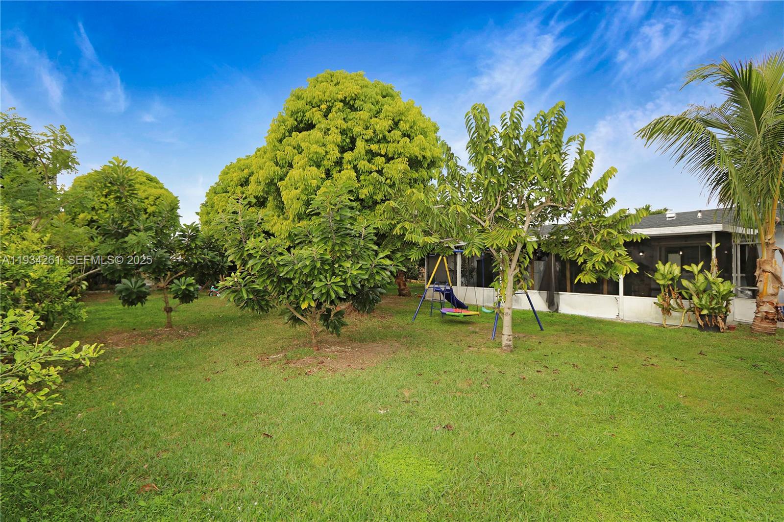 514 Northwest 21st Street Homestead, FL 33030 - Photo 24 of 45 a view of a garden with a patio