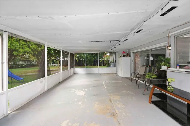 a living room with couches and furniture