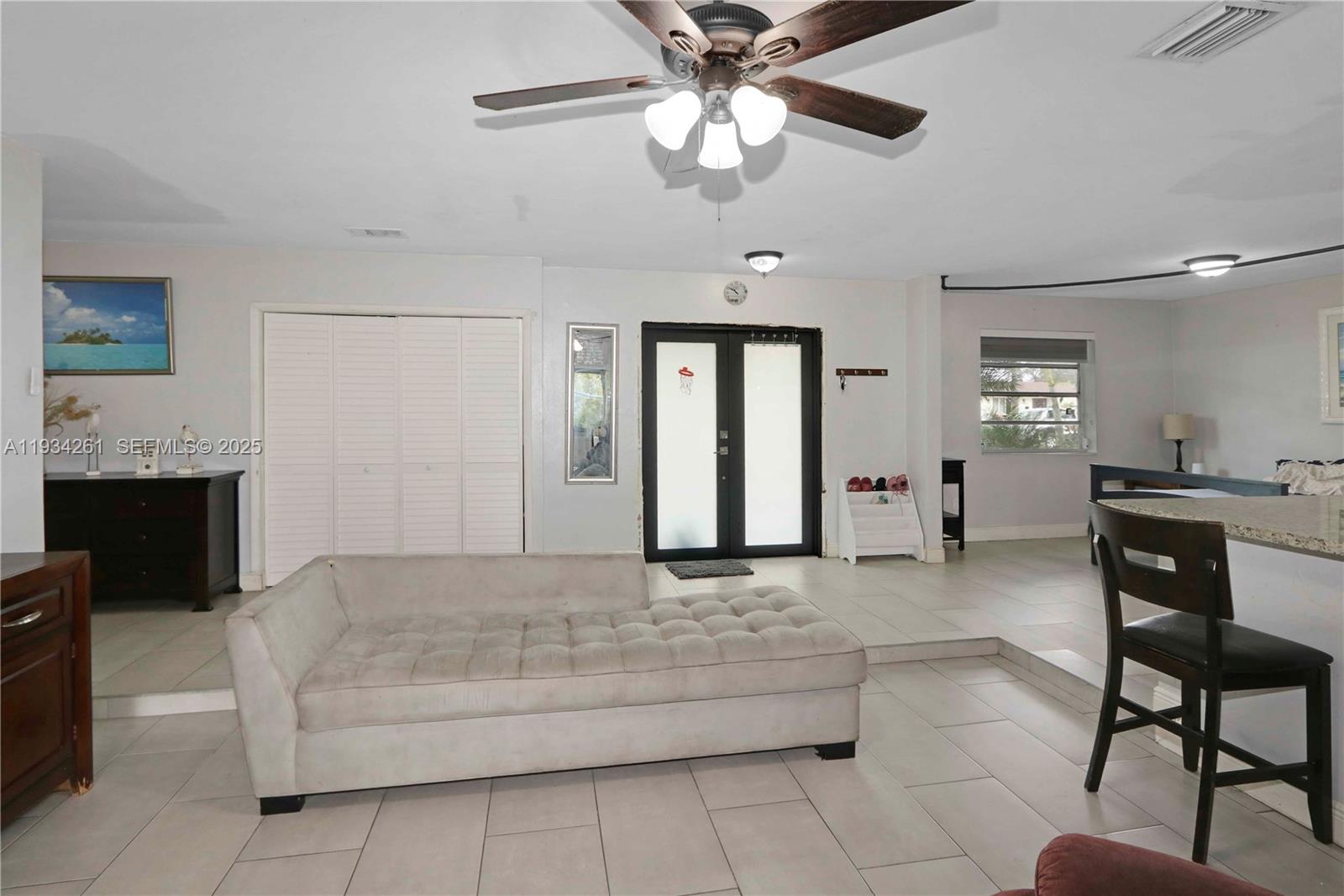 514 Northwest 21st Street Homestead, FL 33030 - Photo 37 of 45 a living room with couches and furniture