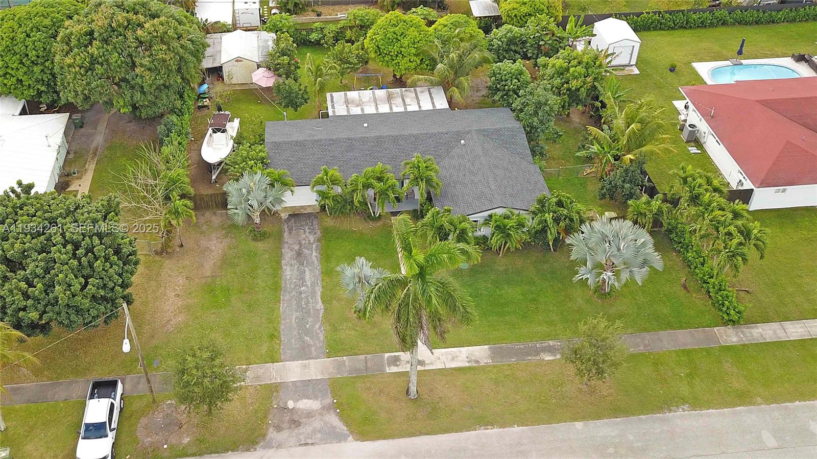 514 Northwest 21st Street Homestead, FL 33030 - Photo 4 of 45 an aerial view of a house with a yard