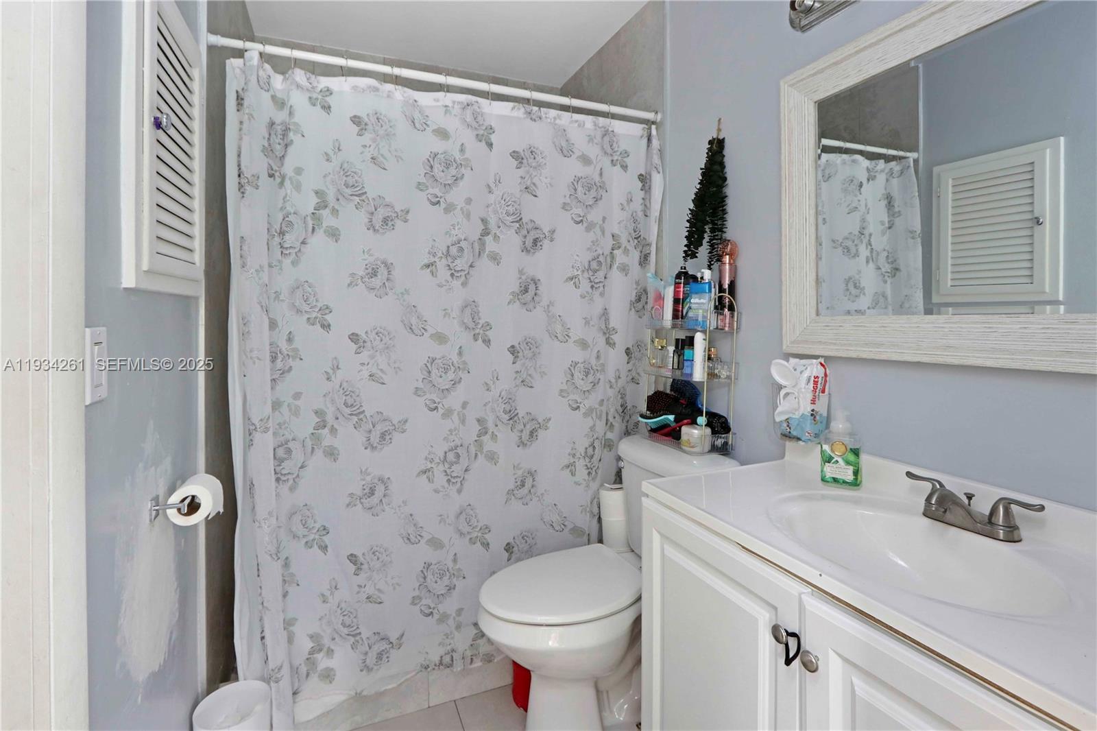 514 Northwest 21st Street Homestead, FL 33030 - Photo 44 of 45 a bathroom with a sink and a toilet