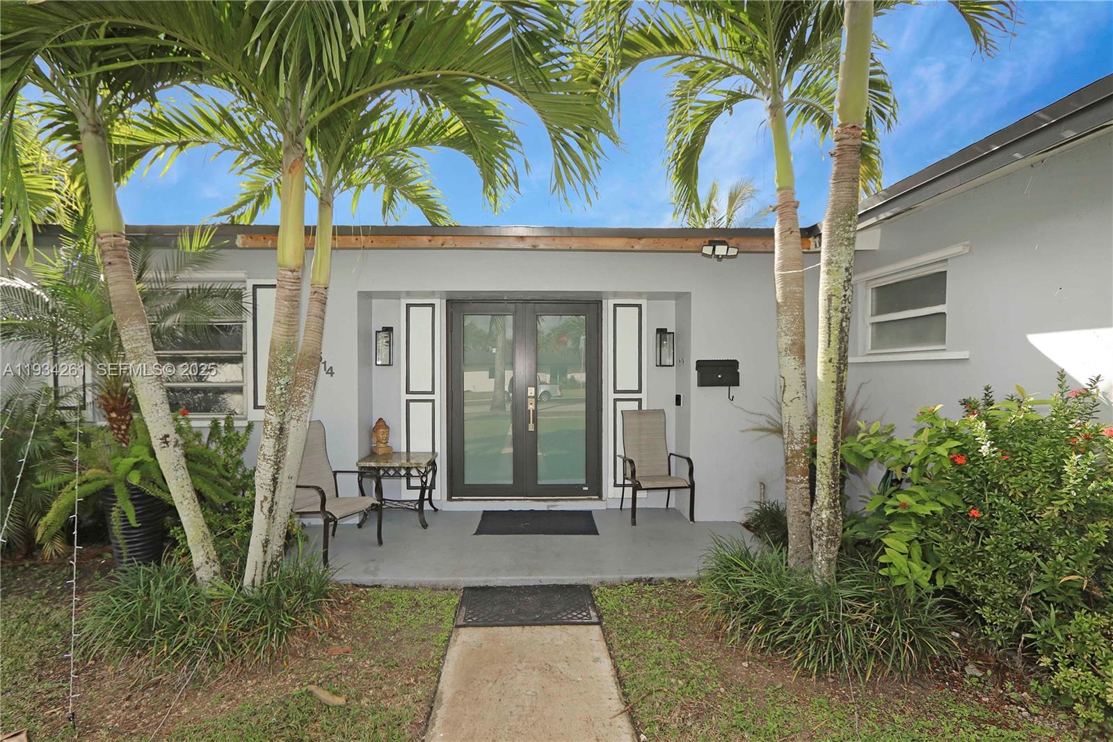 514 Northwest 21st Street Homestead, FL 33030 - Photo 7 of 45 a view of entryway with garden