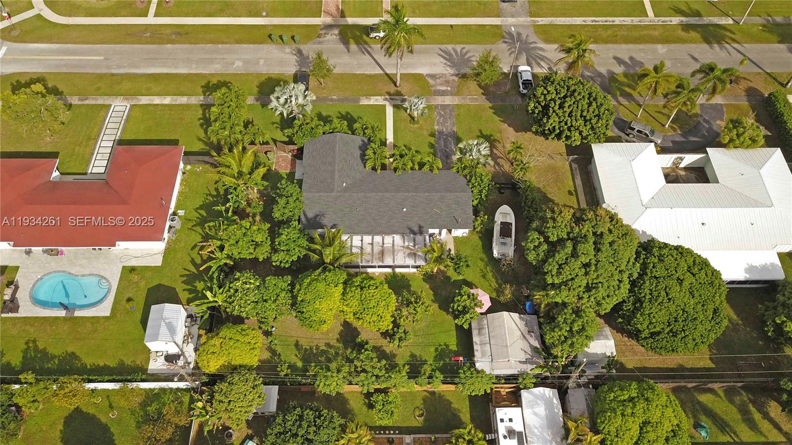 514 Northwest 21st Street Homestead, FL 33030 - Photo 10 of 45 an aerial view of residential houses with outdoor space