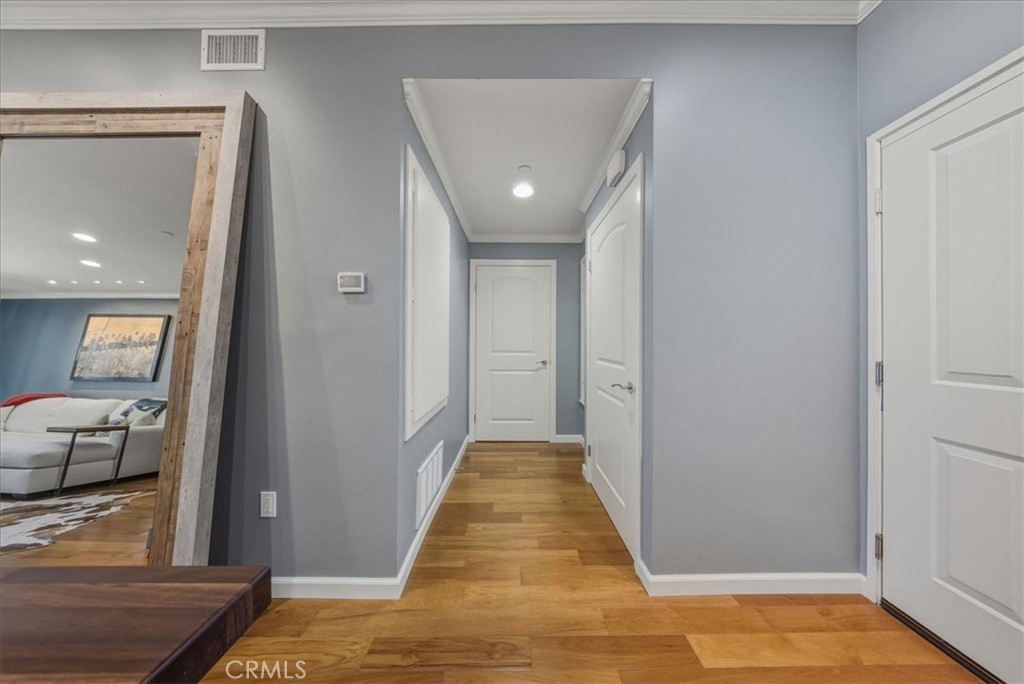 1901 Victoria Avenue, Unit 116 Oxnard, CA 93035 - Photo 16 of 31 a view of a hallway with furniture and window