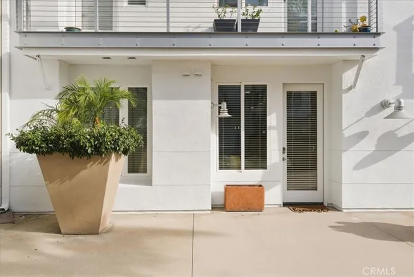 a view of a building with potted plant