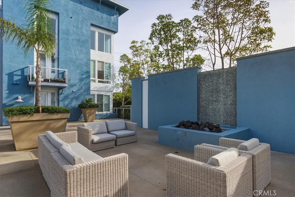 1901 Victoria Avenue, Unit 116 Oxnard, CA 93035 - Photo 21 of 31 a building outdoor space with patio furniture