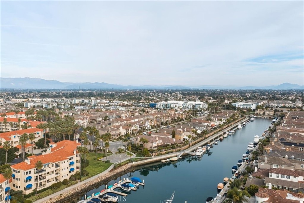 1901 Victoria Avenue, Unit 116 Oxnard, CA 93035 - Photo 25 of 31 an aerial view of residential building and ocean