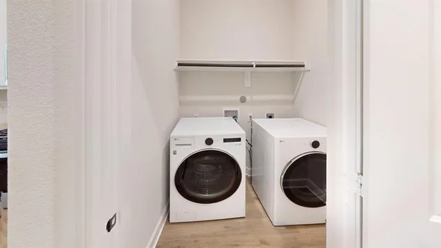a view of a large bed with wooden fence